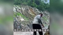 钓鱼佬遇山石滚落，瞬间炸出数米高水花，淡定面对引质疑：跑不了