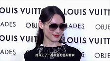 梁洛施虽做不成阔太但很有贵族气质，一身黑色西装梳大背头，美炸