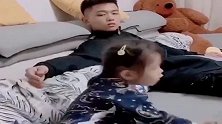 哥哥跟妹妹说话，妹妹无动于衷，这下哥哥真丢面子啊！