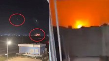 伊拉克埃尔比勒遭火箭弹袭击：现场传出数声爆炸巨响，夜幕被点亮