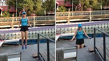 泰国女子在码头跳绳踩塌木地板 整个人掉进河里