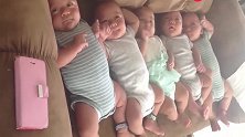 妈妈把五胞胎抱到沙发上放成一排，萌萌的这画面简直太可爱了！