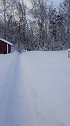 北极圈里的村庄，淡蓝的天空，洁白的雪。