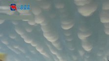 美轮美奂 伊拉克小镇上空现“葡萄云”