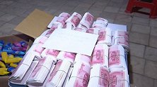 全是钱！443万百元大钞正打印 警方破门钱还是热的