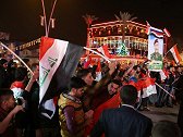 示威群众走上巴格达街头，美使馆成攻击目标，军警镇压致99死