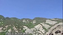 军都山发现神秘古崖居遗址，坐落在峭壁之上，专家认为是奚族留下