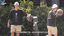 贾斯汀现身球场，穿黑T恤配短裤休闲随性，棒球帽反戴少年感十足