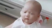 外婆说小宝宝的酒窝长错地方了，宝宝听了后很生气，好搞笑！
