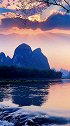 云气晚霏霏，高林送落晖。悠然江上水，遥望戍烟归。漓江 人间仙境美如画 悬崖之上首映