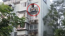 居民在家无意间发现对面楼空调机不对劲 仔细一看吓得报警