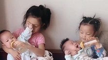 有两个温柔的姐姐真好，一起帮妈妈照顾小宝宝