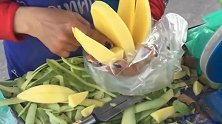 街头小吃：看到大妈这样切芒果,我才知道以前的都白吃了