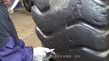 修补5米高的巨型轮胎，国外修理工大秀操作，看完不得不佩服