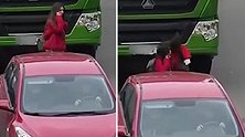 乌克兰：一女子打电话时过马路被水泥罐车卷入车底