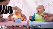 气温骤降，双胞胎萌娃被包成粽子，吃饭困难重重，南方孩子太难了