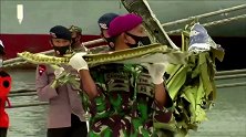 坠海前完整无损 撞击水域后裂开 印尼坠毁客机黑匣子已找到