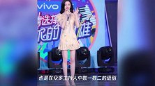 鞠婧祎与何老师站在一起,身高暴露了,没有明显的13厘米