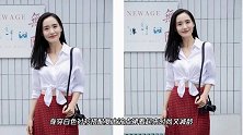 王智写真，身穿白色衬衫搭配复古波点裙看起来时尚又减龄