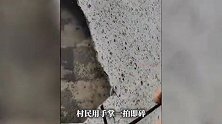 浙江一安置房外墙质量堪忧，用手掌一拍即碎、徒手就能轻松掰下，视频曝光