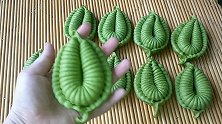 用菠菜汁做的叶子小馒头，压一压，卷一卷，挑食的孩子也爱吃