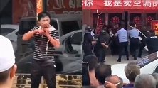江苏一男子因感情纠纷砍伤女友 持刀架自己脖子与民警对峙