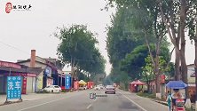 这里的居民离广汉市区太近了，一首《中国人》听半首就到了，幸福
