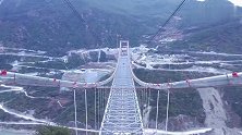 云南：世界最大跨度独塔单跨地锚式悬索桥合龙 全长1017米