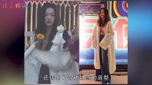 李嫣大冷天穿吊带装街头拍照，撩发甩头画风显成熟