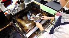 韩国人用铁板烧烹饪炒面，你能给几分？