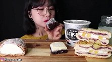 美女试吃罐装黑芝麻冰淇淋、巧克力奶油软包、摩卡奶油面包